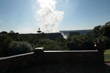 The spray shooting in the air view from Victoria Falls Hotel