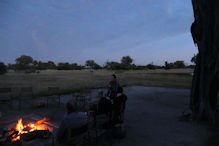 breakfast by the camp fire with water buck hanging around