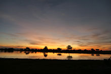 sunset over water hole