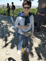 Robyn astride the meridian line at the Royal Observatory